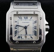 A gentleman`s stainless steel Cartier Santos quartz wrist watch, with Roman dial and cabochon