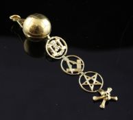 A 20th century patent 9ct gold masonic ball pendant, containing four hinged gold symbols, the All