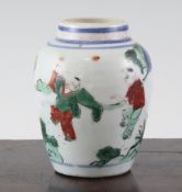 A Chinese Wucai small ovoid vase, Transitional period c.1640, painted with three children playing in