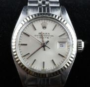 A lady`s late 1970`s stainless steel Rolex Oyster Perpetual Date wrist watch, the silvered dial with