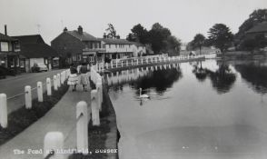 An album of one hundred and twenty seven assorted postcards, depicting views of the village of