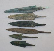 A collection of six Greek bronze arrow heads, c.8th century B.C., largest 5.5in.