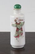 A Chinese famille rose cylindrical snuff bottle, mid 19th century, painted with a figure holding a