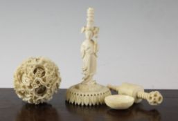 A Chinese ivory concentric ball on stand, early 20th century, the ball carved in relief with dragons