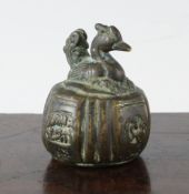 An Indian / Islamic bronze weight, 17th / 18th century, cast as a seated hen, the fluted base with