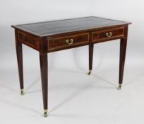 An Edwardian mahogany satinwood crossbanded two drawer writing table, on square section tapered