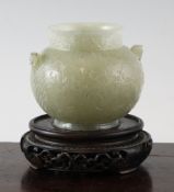 A Chinese Moghul style pale celadon jade vase, 18th / 19th century, of globular form, carved in