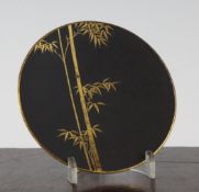 A Japanese Komai style inlaid iron small dish, Meiji period, decorated with two shoots of bamboo,