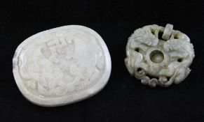 A Chinese jadeite plaque and similar pendant, the plaque of white stone carved in relief with twin