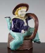 A William Brownfield & Sons majolica manxman teapot, late 19th century, modelled as a three legged