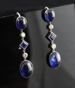 A pair of 18ct white gold diamond and sapphire drop earrings, set with cabochon and square cut