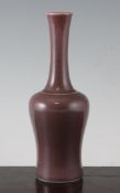 A Chinese aubergine glazed bottle vase, Kangxi mark but later, 8.8in.