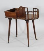 A George III mahogany cutlery stand, with galleried D end, cutlery space and carrying handle on