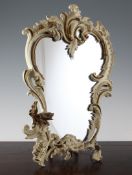 A 19th century French painted bronze toilet mirror, of asymmetrical scrolling form, 16.5in.