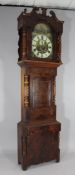 An early 19th century Yorkshire mahogany eight day longcase clock, the 14 inch arched painted dial