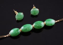 An 18ct gold and jadeite bracelet and pair of matching earrings, the bracelet set with four oval