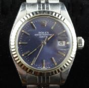 A lady`s early 1980`s stainless steel Rolex Oyster Perpetual Date wrist watch, with blue dial, baton