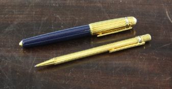 A Pasha de Cartier gilt plated and lapis lazuli fountain pen, with 18ct gold nib, together with