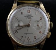 A gentleman`s Swiss 18ct gold Aidix chronograph wrist watch, with Arabic numerals and two subsidiary