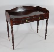 A Regency mahogany bow front washstand, with shaped back and spiral turned legs, W.3ft 4in.