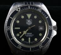 A gentleman`s stainless steel Tag Heuer 1000 Professional quartz wrist watch, with rotating bezel