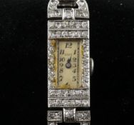 A lady`s 1930`s platinum and diamond set Zivy cocktail watch, with rectangular Arabic dial and