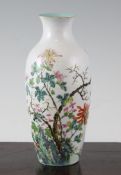 A Chinese famille rose ovoid vase, Qianlong seal mark but Republic period, painted with