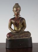A South East Asian gilt bronze seated figure of Buddha, 19th century or earlier, 9.5in.