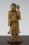 A Chinese soapstone standing figure of Liu Hai, 19th century, holding cash in his left hand and a