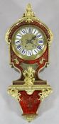 A 19th century French red boulle work Louis XIV ‘Tete de Poupee’ style wall clock, the brass dial