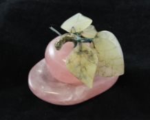 A Chinese rose quartz carving of an apple, with hardstone leaves, 2.5in.; rose quartz stand