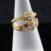 Two Edwardian 18ct gold gem set dress rings, of foliate design, (2 stones missing) Sizes L & M.