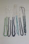 Six Roman bead necklaces, re-strung and composed of green, black, blue and turquoise beads, 1st/