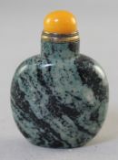 A Chinese zebra jasper snuff bottle, the stone with pale green back inclusions, 5.7cm., stopper