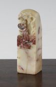 A Chinese soapstone square seal, 18th / 19th century, the creamy coloured stone with chicken`s-blood