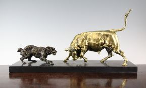 A mid 20th century bronze figural group, modelled with a dog attacking a bull, on black marble base,