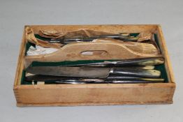 A set of five pairs of Georgian steel table knives and two prong forks, with horn handles, made by