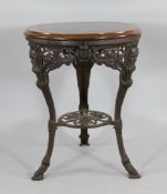 A late Victorian W.G. Grace cast iron circular pub table, H.2ft 6in.
