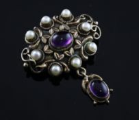 A late Victorian 9ct gold, cabochon amethyst and split pearl set drop pendant brooch, of oval form