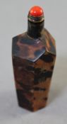 A Chinese tortoiseshell veneered facetted snuff bottle, three sides incised and gilded with