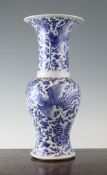 A Chinese blue and white yen-yen vase, Kangxi period, painted with phoenixes amid flowers and