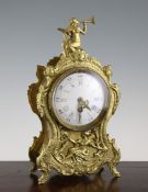 An early 20th century French cast brass mantel timepiece, of Louis XVI style, with enamelled Roman