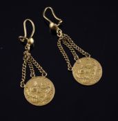 A pair of middle eastern coin drop earrings, each set with a Persian gold coin suspended from
