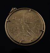 A Mexican 50 pesos gold coin, in gold pendant mount, gross 47.6 grams.