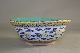 A Chinese famille rose `crane` bowl, Xianfeng seal mark and of the period, with turquoise glazed
