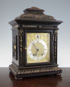 A late Victorian parcel gilt ebonised oak bracket clock, with silvered chapter ring and gilt brass