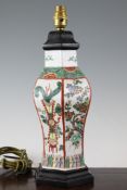 A Chinese famille verte hexagonal baluster vase, early 20th century, painted with various panels