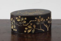 A rare Chinese coromandel lacquer oval box and cover, 18th century, decorated with sprigs of