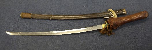 A Japanese katana, the 17th / 18th century blade signed to the tang, with gilt bronze mounts