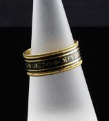A George III enamelled gold memorial ring, with black enamelled band inscribed "Mrs Betty Wagstaff